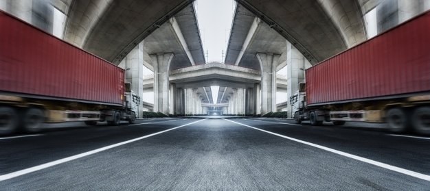 two trucks road