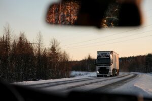 Truck driving on a snowy road