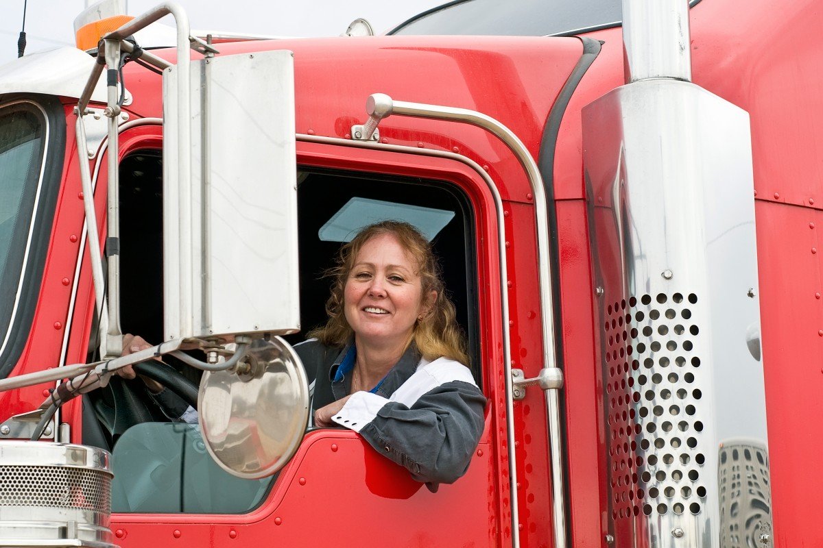 Woman Driving An Eighteen Wheeler