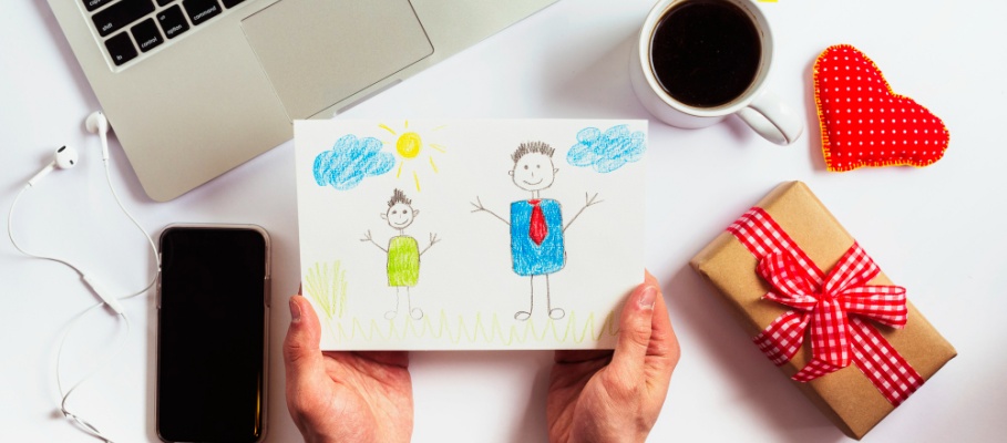 https://missionfinancialservices.net/wp-content/uploads/2022/06/fathers-day-composition-with-laptop-hands-holding-drawing.jpg