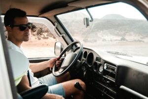 Young man driving a truck