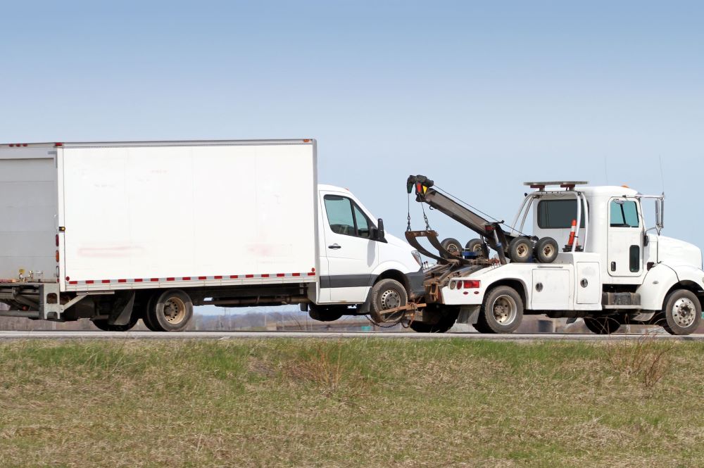 truck towing a truck