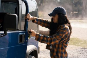 Woman opening truck door