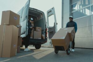 drivers loading a delivery van
