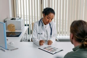 Doctor performing DOT medical exam