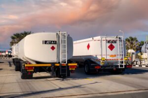 two fuel trucks at a fuel depot