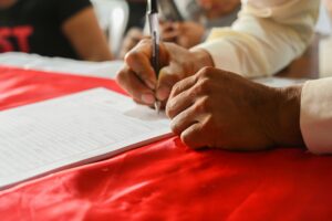Person signing a document