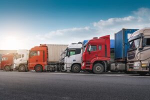 A Row of Colorful Trucks Ready for Cargo Transport