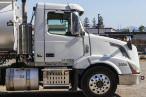 white freight truck parked