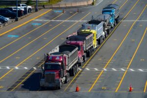 Colorful trucks lined up on a road
