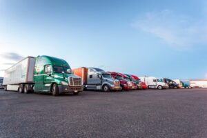 Many trucks parked on parking lot, USA.