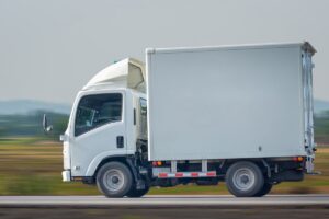 Small truck driving on the highway