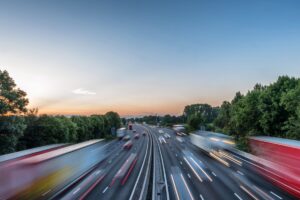 Sunset view heavy traffic moving at speed