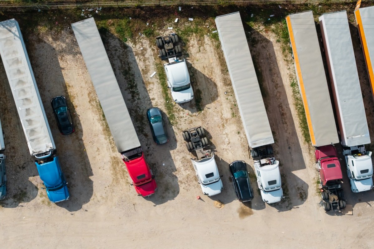Aerial view parking lot with semi trucks