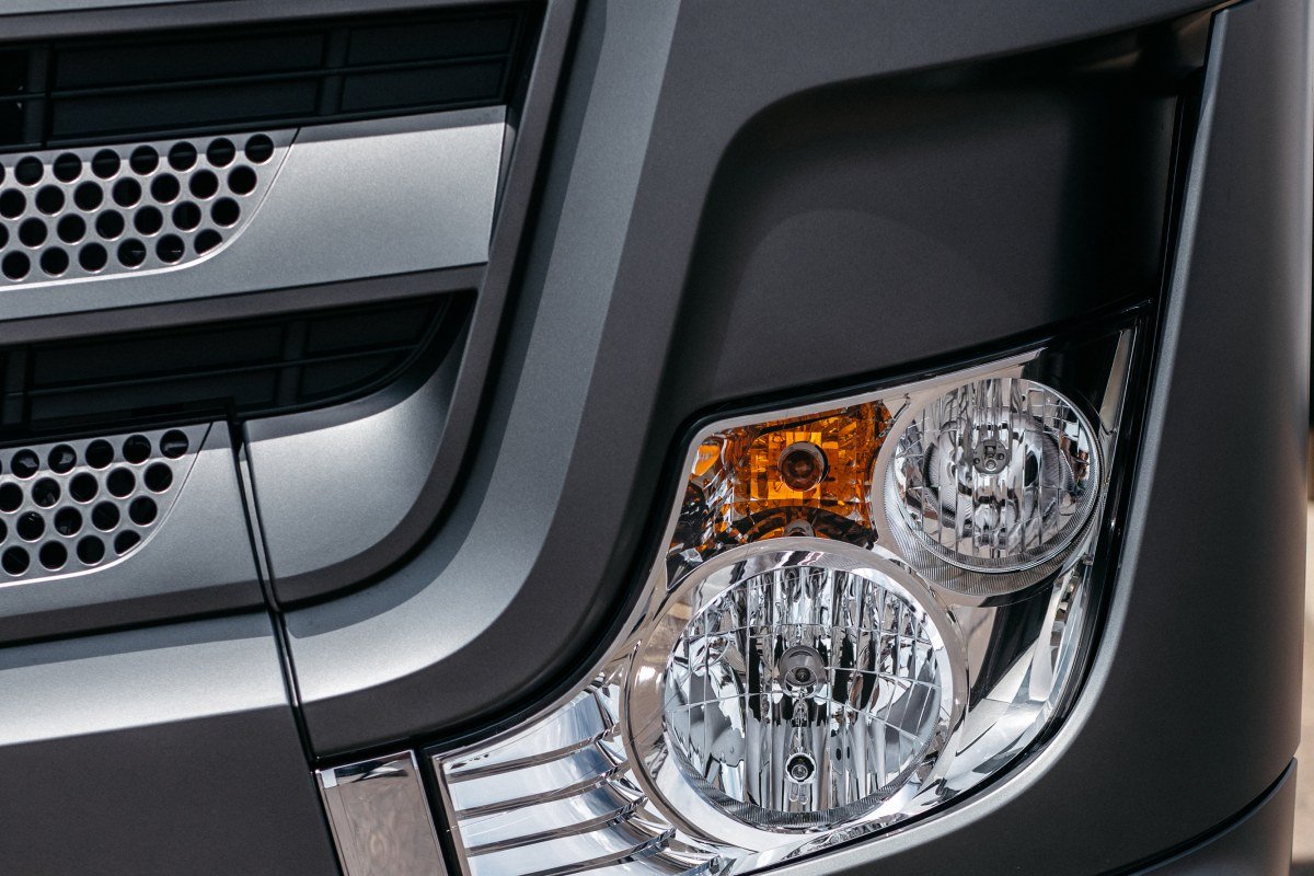 front optics of a new modern gray truck close-up