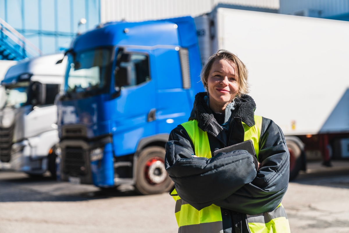 Woman truck driver working in logistics and transportation