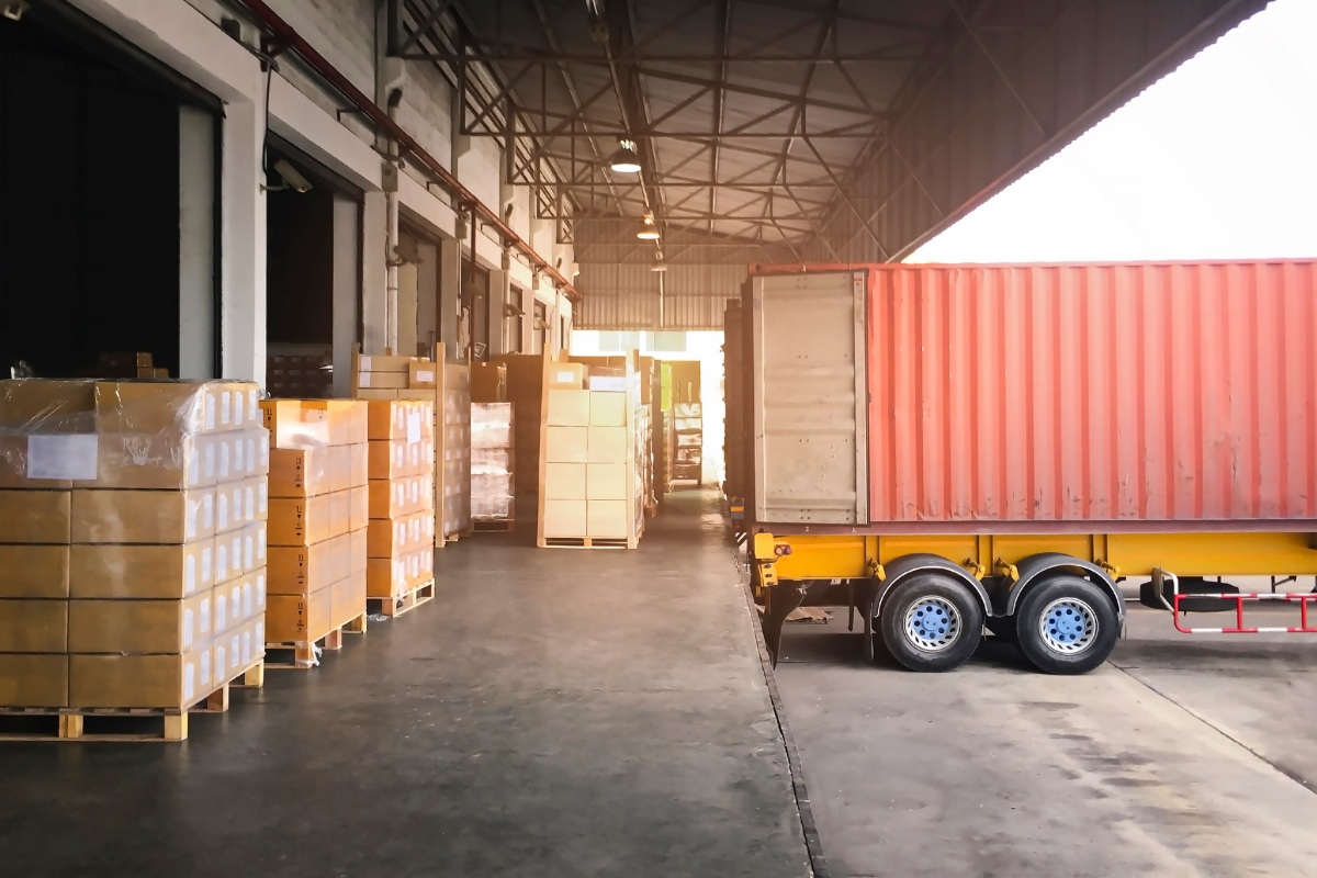 Cargo Container Truck Parked Loading at Dock Warehouse. Cargo Sh