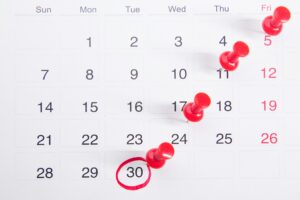 Calendar marking a trucking company's biennial FMCSA registration update deadline